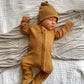 Organic Waffle Knit Footie With Bow Or Hat