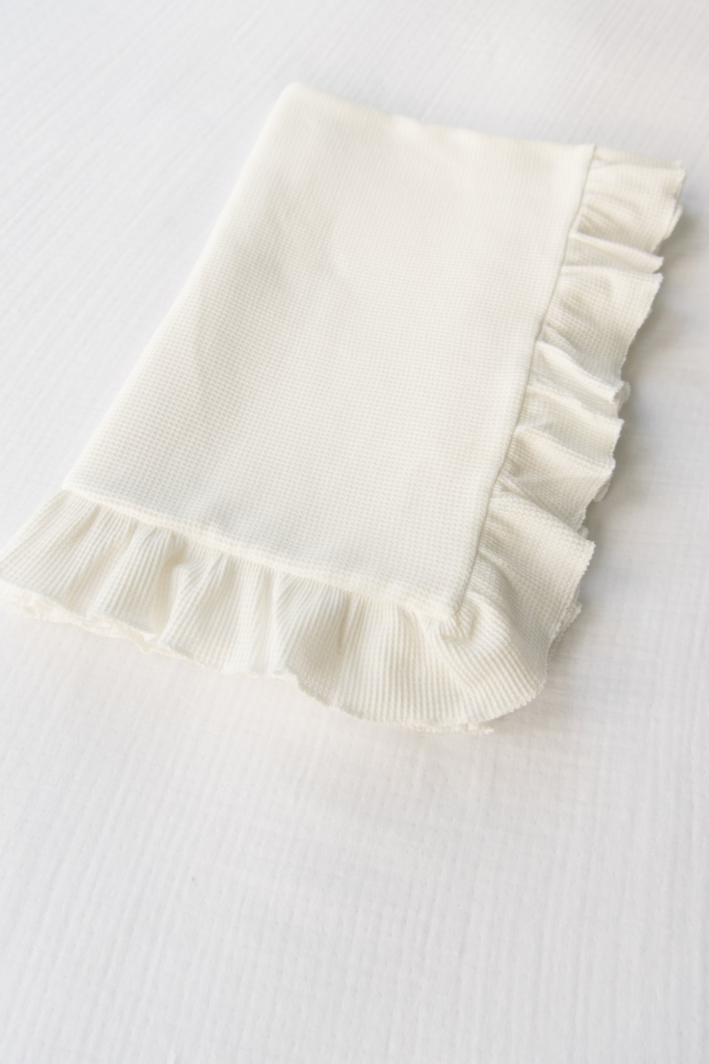 Embroidered Waffle Knit Ruffled Blanket