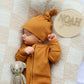 Organic Waffle Knit Footie With Bow Or Hat